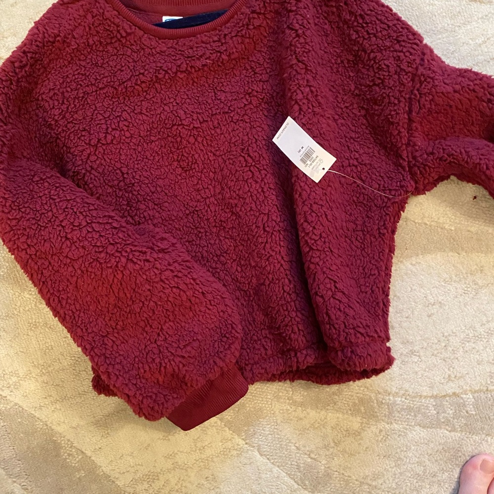 Girls cranberry fleece top size 8 new with tags.